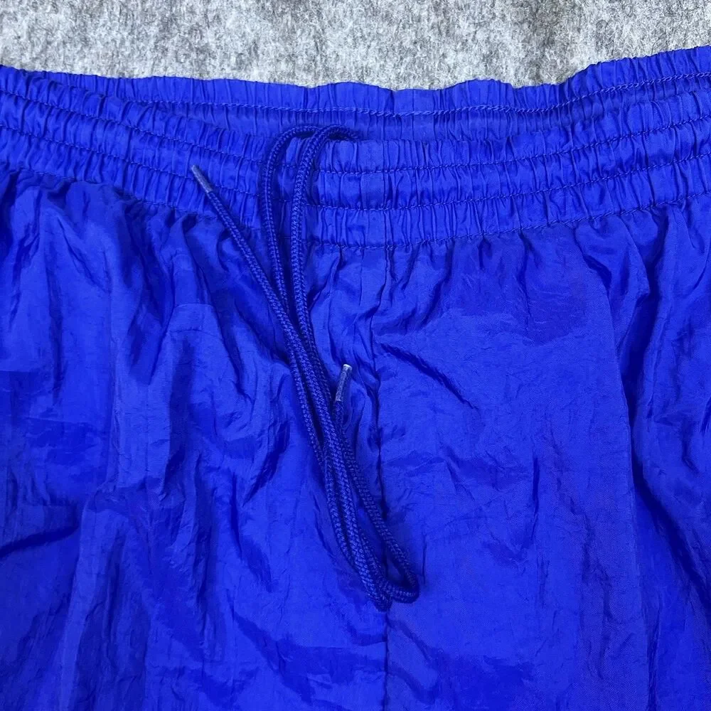 Vtg Reebok Men's Track Pants Blue Nylon Elastic Waist Zip Ankle 90's Size Medium